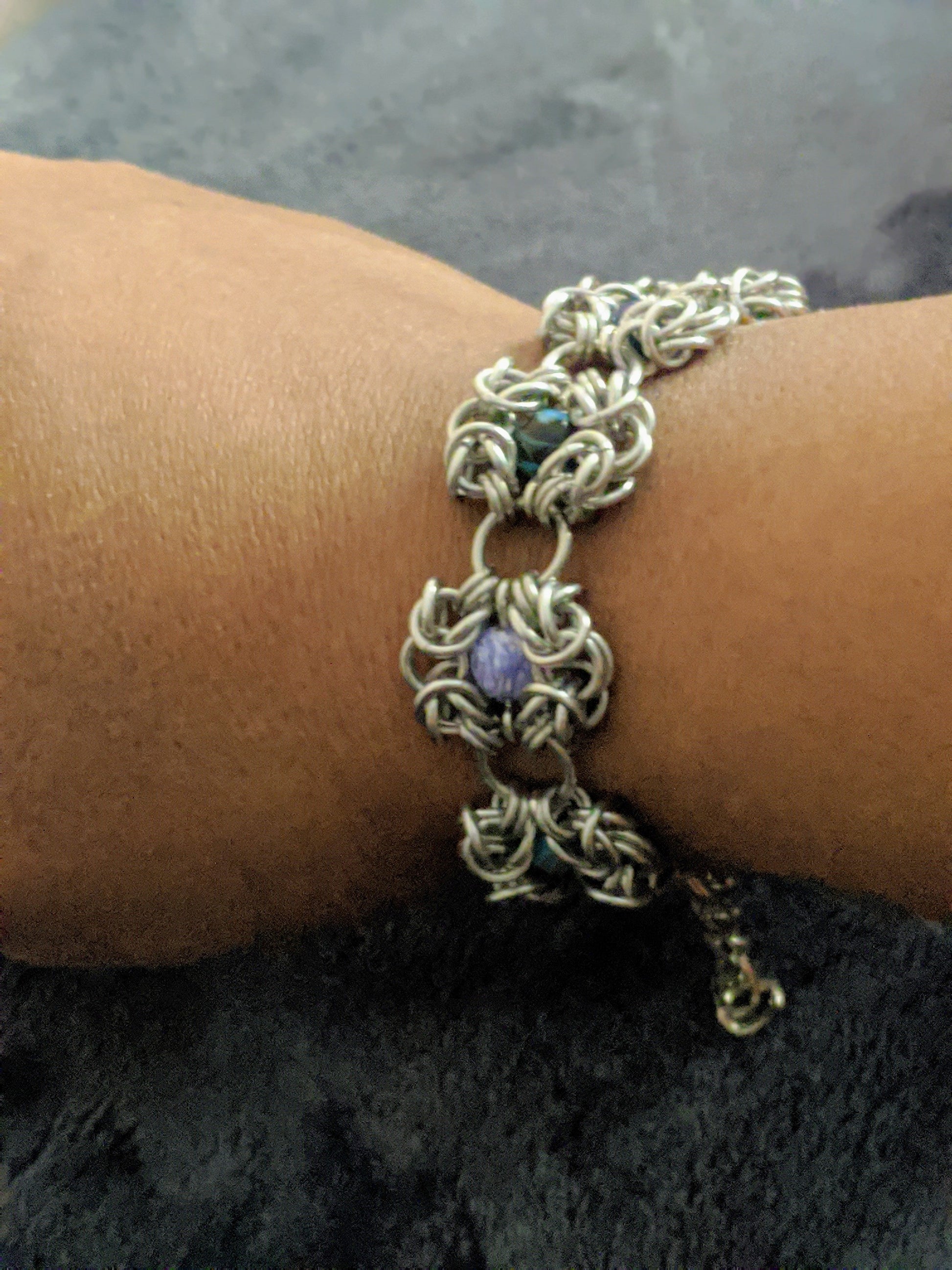 Close up of a Romanov Chainmail bracelet on a wrist