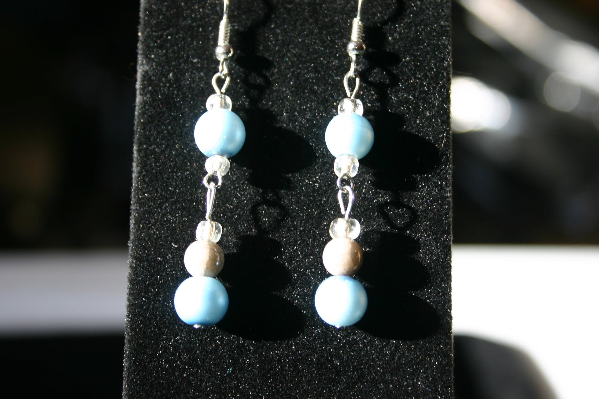 Blue glass beaded dangle earrings