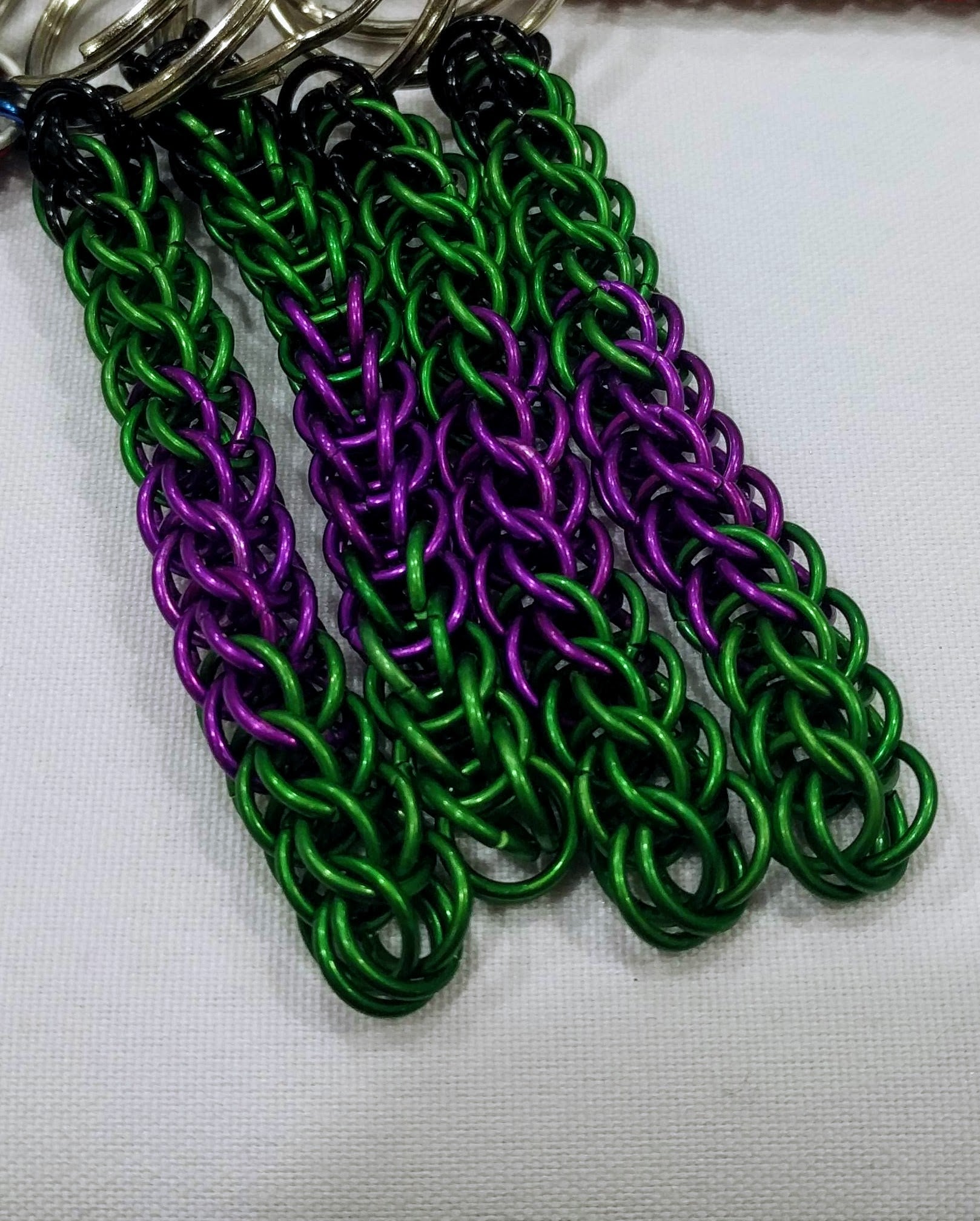 Superhero inspired keychains Geeky Keychains Dragon & Wolf Designs Green/purple