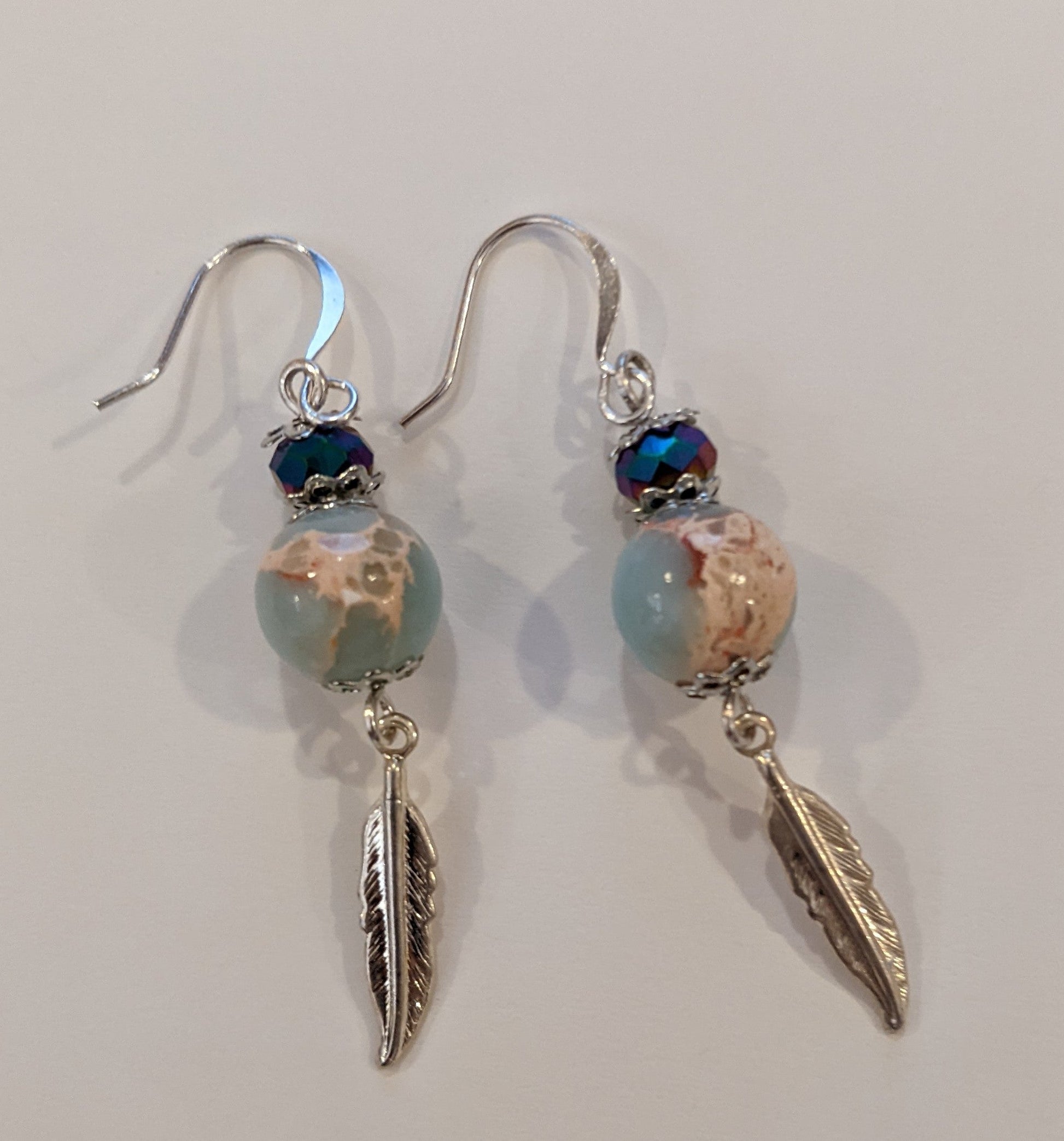 Feathered Beauty Beaded Earrings Dragon & Wolf Designs