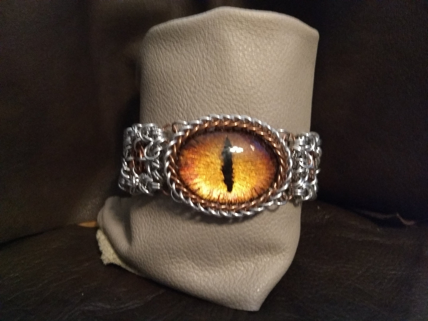 Striking Dragon Eye on a byzantine/moebius chainmail bracelet Chainmail Bracelets Dragon & Wolf Designs