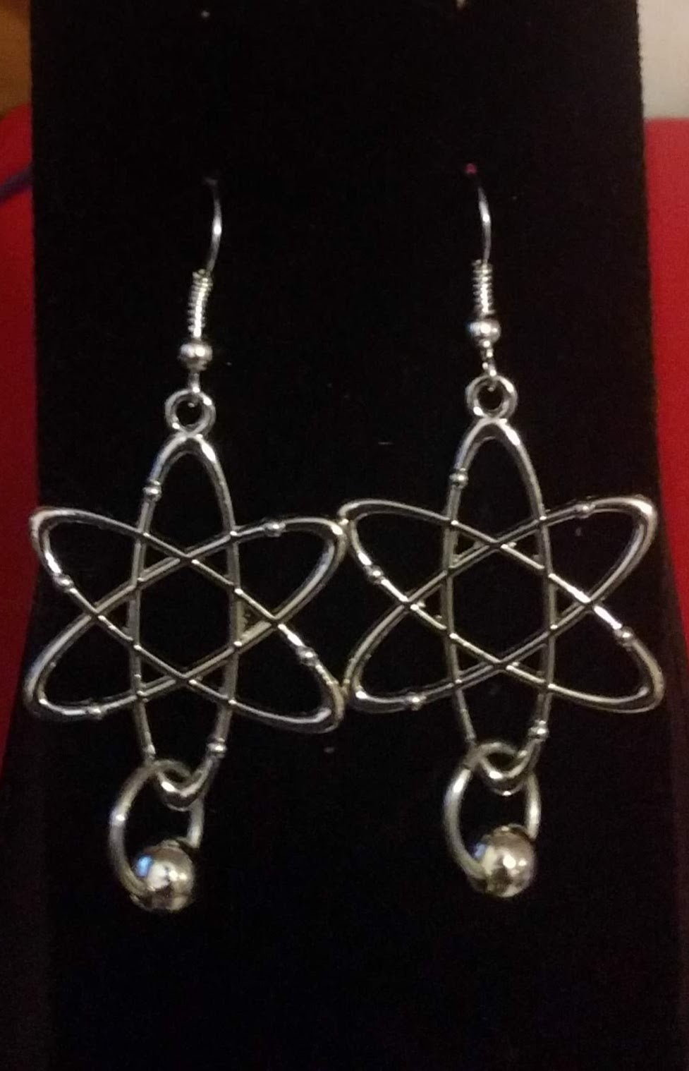 Atomic symbol dangle earrings Dangle Earrings Dragon & Wolf Designs