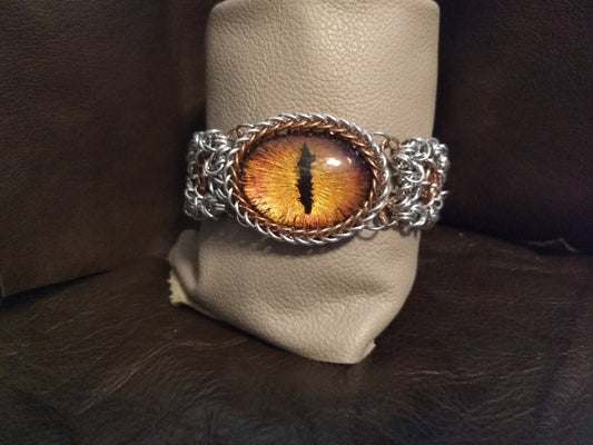Striking Dragon Eye on a byzantine/moebius chainmail bracelet Chainmail Bracelets Dragon & Wolf Designs   